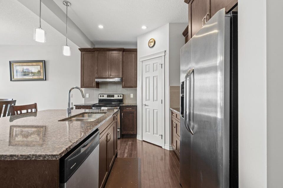 Welcome to your home away from home with plenty of space for your family including two living spaces, full kitchen, dining area, workout area, private patio, four bedrooms and two and a half bathrooms. 