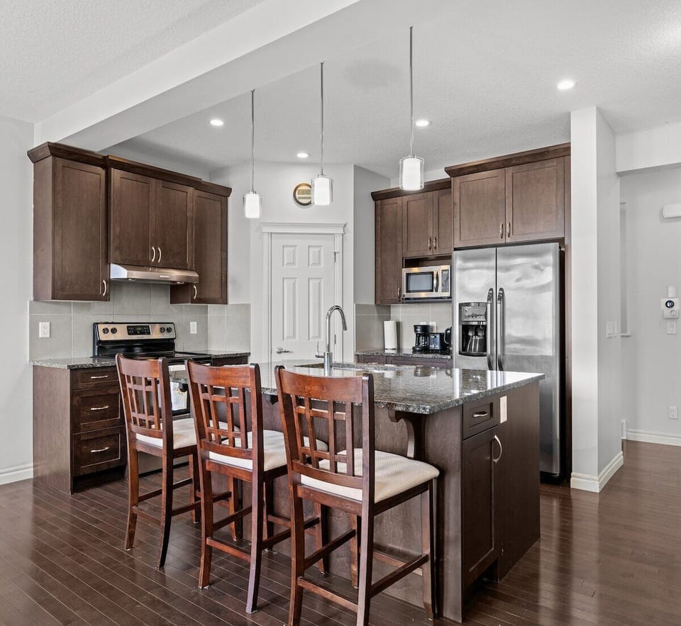 Welcome to your home away from home with plenty of space for your family including two living spaces, full kitchen, dining area, workout area, private patio, four bedrooms and two and a half bathrooms. 