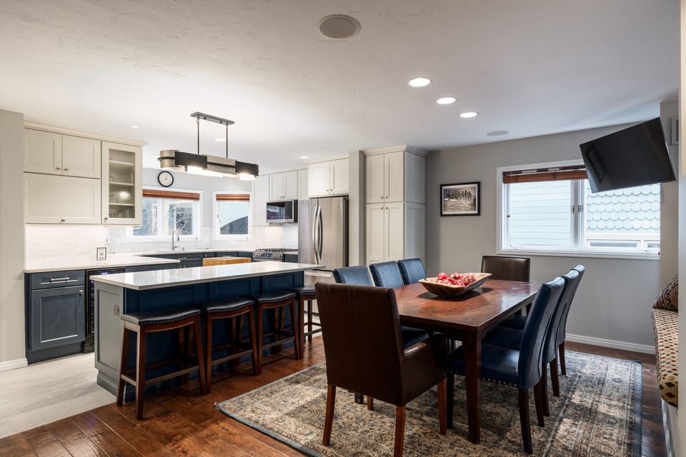 - Whip up your favorite meals in a chef ready kitchen with quartz countertops
- Share laughs and stories over dinner at the stylish dining table for eight
- Enjoy seamless entertaining with island bar seating and cozy built in nook