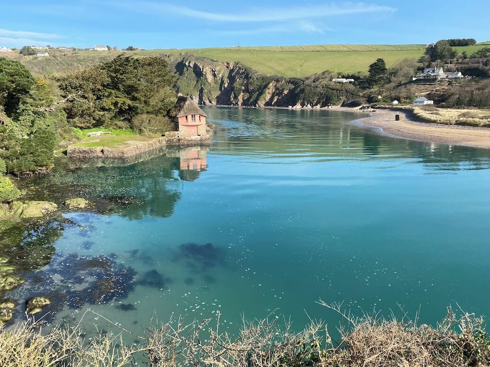 The beautiful estuary and iconic boathouse at Jenkins quay in Bantham