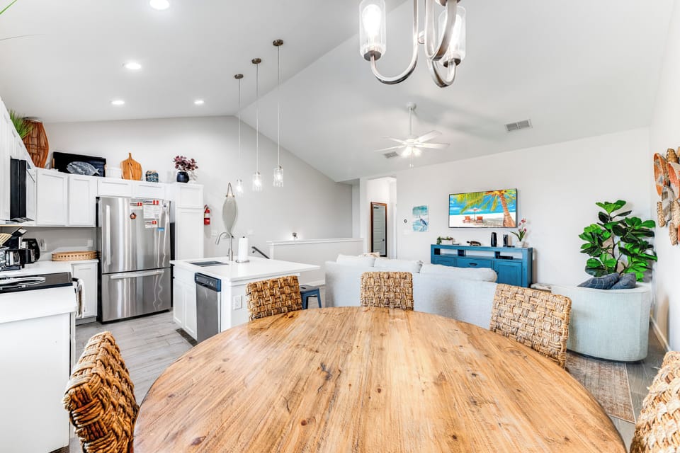 Your spacious open-plan living flows seamlessly from the modern kitchen to cozy dining and living areas, perfect for gathering with loved ones.