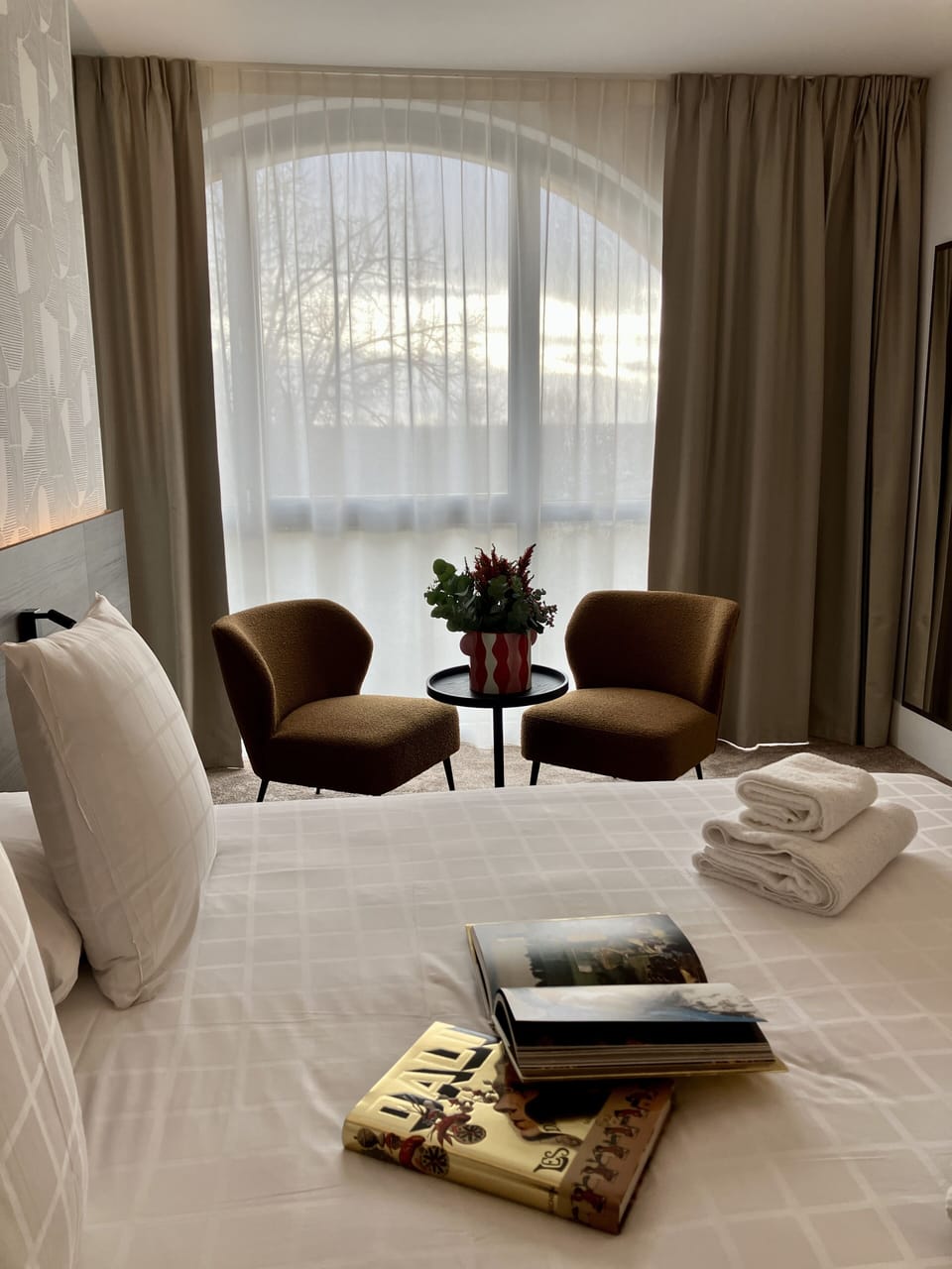 Premium bedding, memory foam beds, in-room safe, laptop workspace