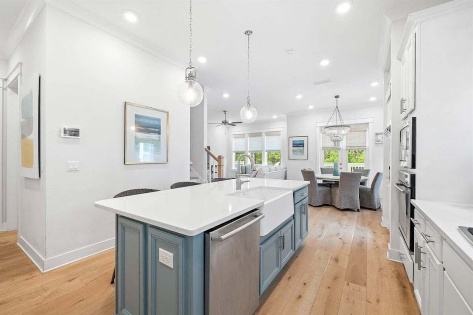 A modern open kitchen with a large island, perfect for entertaining and meal prep.