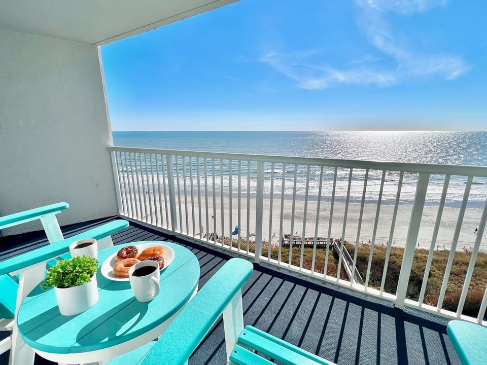 Ocean light, open living space, and a private balcony — together when you want it, quiet when you don’t.