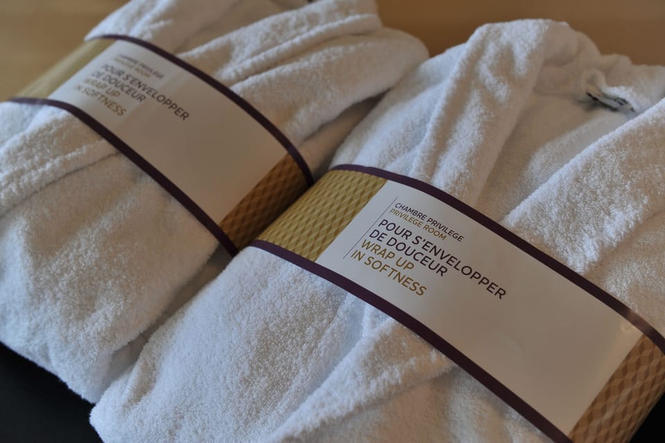 Eco-friendly toiletries, hair dryer, towels