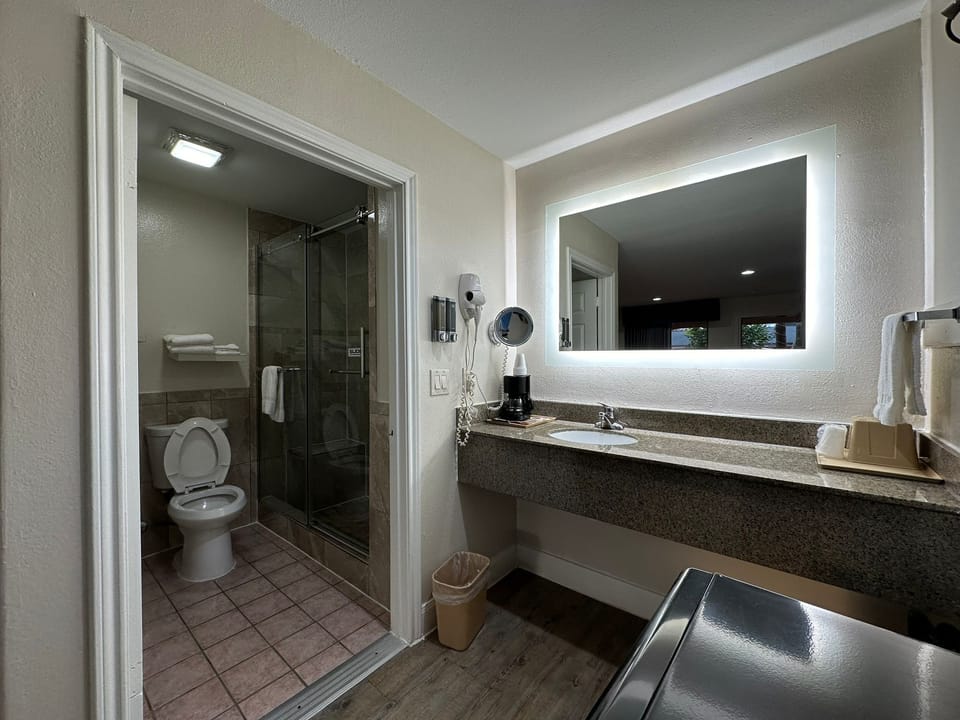 Hair dryer, towels, soap, shampoo