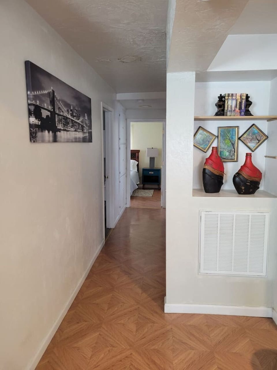 Hallway connecting bedrooms and living spaces for easy access throughout the home.
