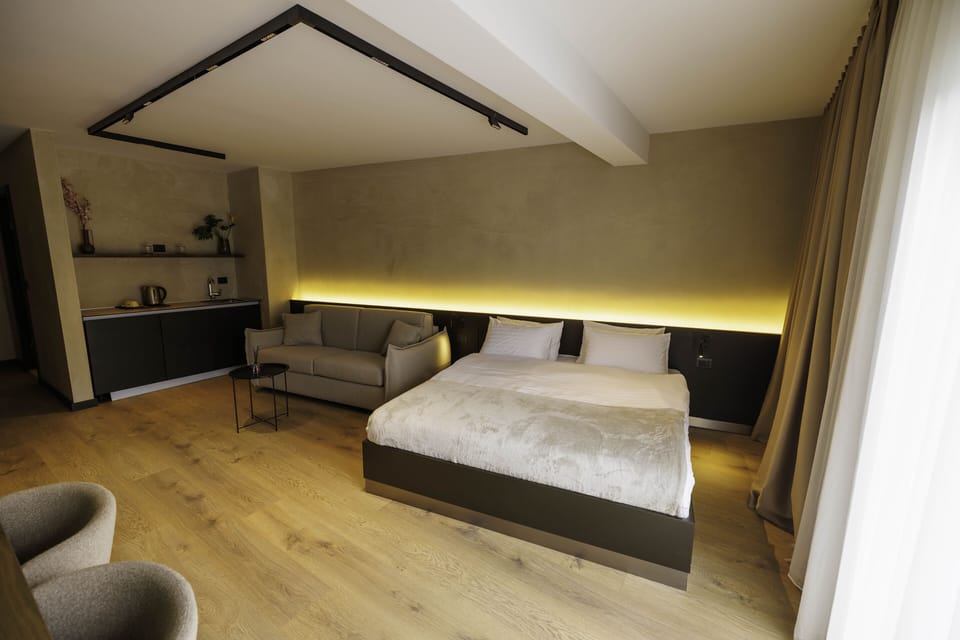 Family Room | Memory foam beds, minibar, in-room safe, individually decorated