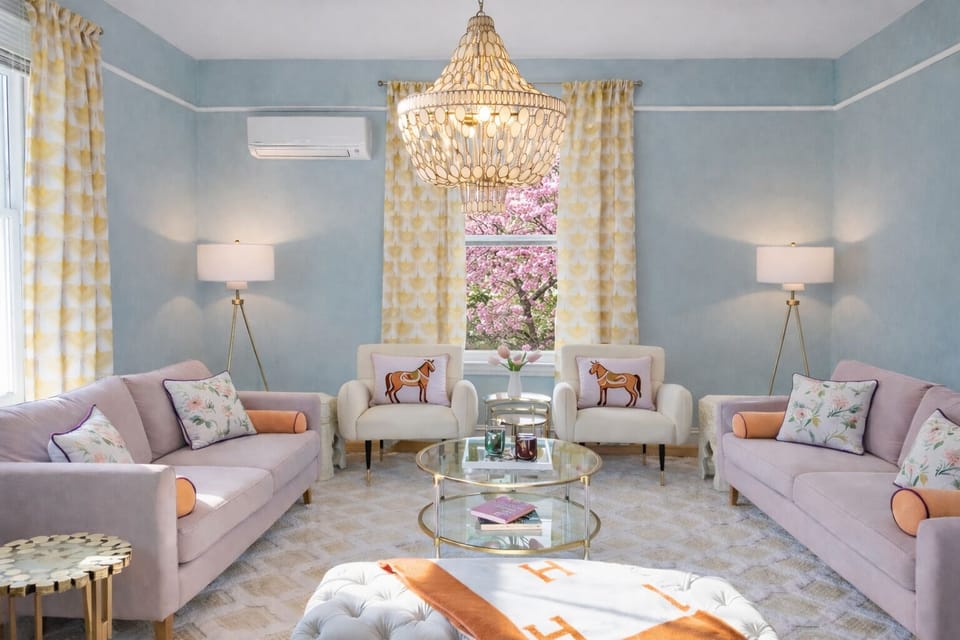 Living features a TV (not pictured) that is on a cute rolling easel cart so it could be relocated to the dining room, etc. Even though the whole house has dual-zone HVAC, there is a mini split in this room to make it super comfy in any temp!