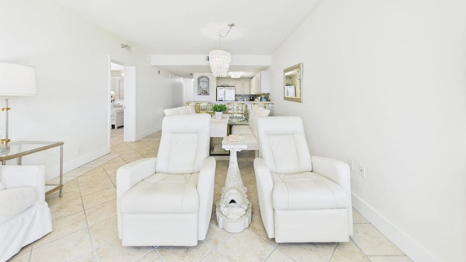 2 comfy reclining armchairs in living area