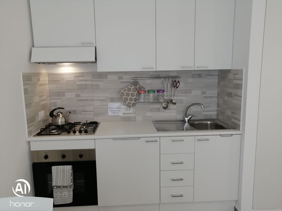 Standard Apartment | Private kitchen | Electric kettle, highchair
