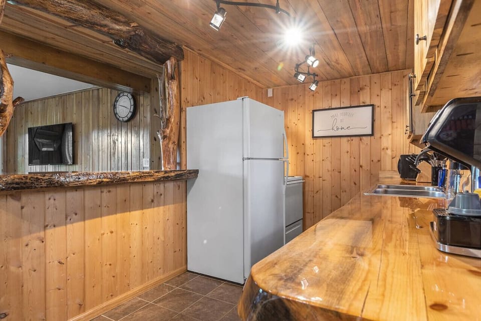 Our fully stock kitchen makes mealtime so easy! Coffee maker | Refrigerator | Microwave | Kitchenwares
