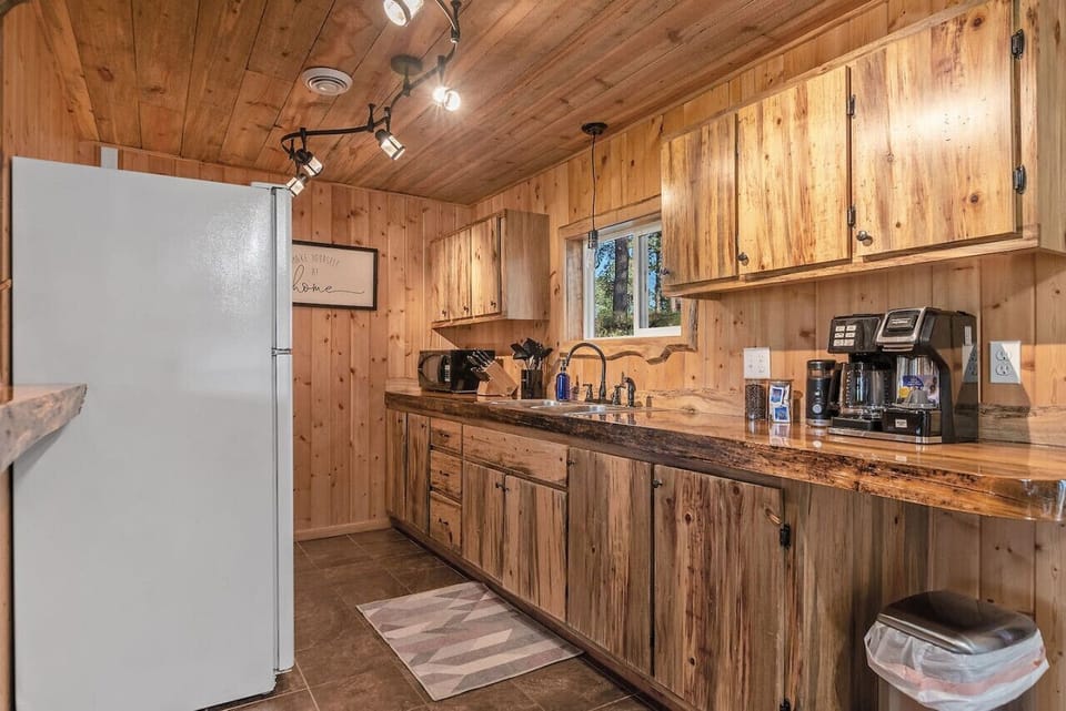 Off the living room is where our fully stocked kitchen is!