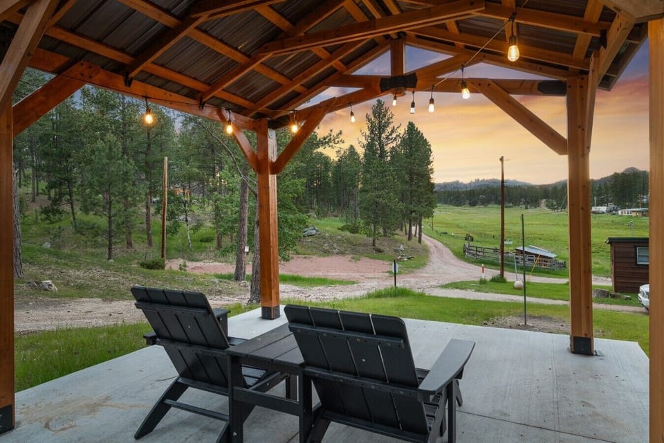 Soft lights, mountain silhouettes, and that peaceful Black Hills glow.