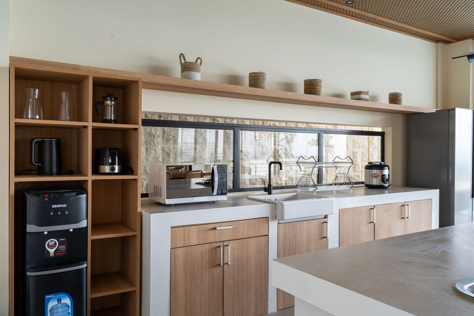 Villa | Private kitchen | Fridge, microwave, oven, stovetop