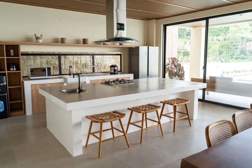 Villa | Private kitchen | Fridge, microwave, oven, stovetop