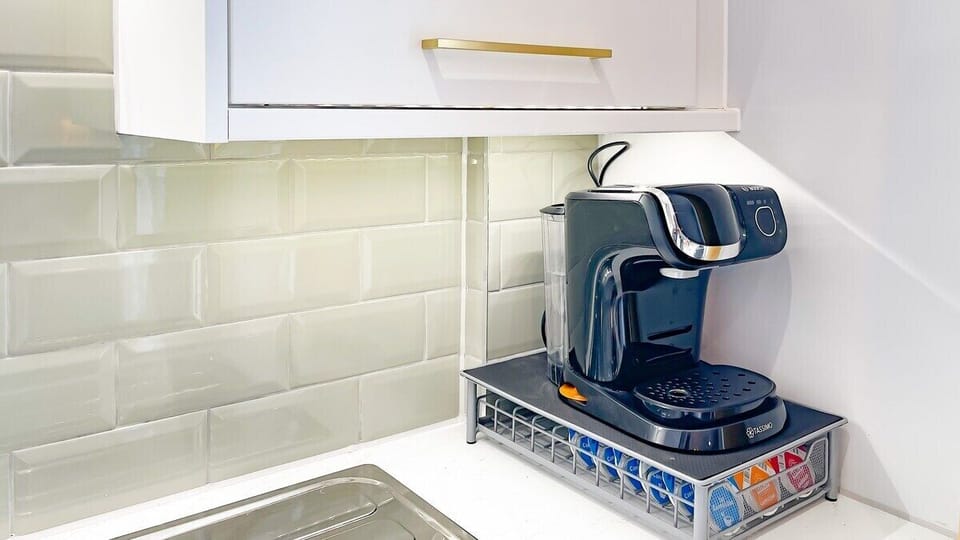 A coffee machine and various fully stocked capsules are provided for all you coffee lovers.