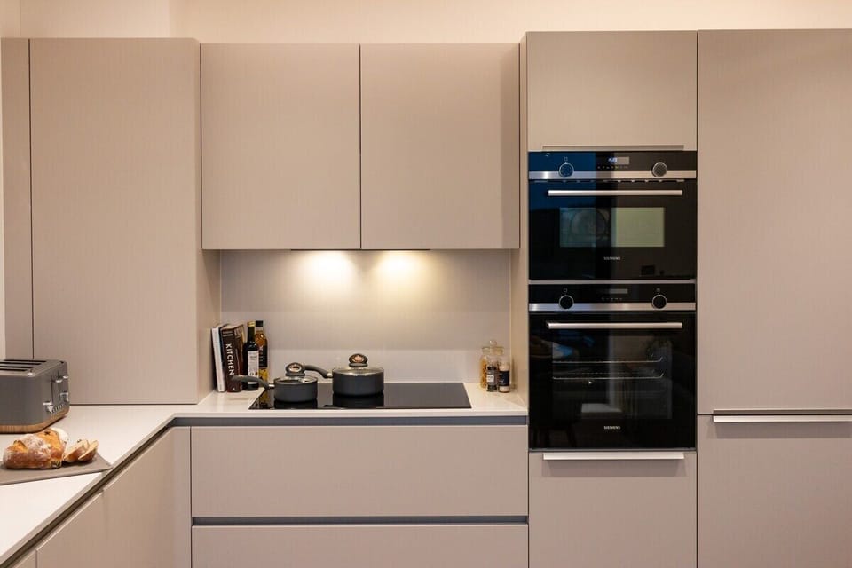 Enjoy the refined aesthetics and top-of-the-line amenities of our exceptional kitchen space.