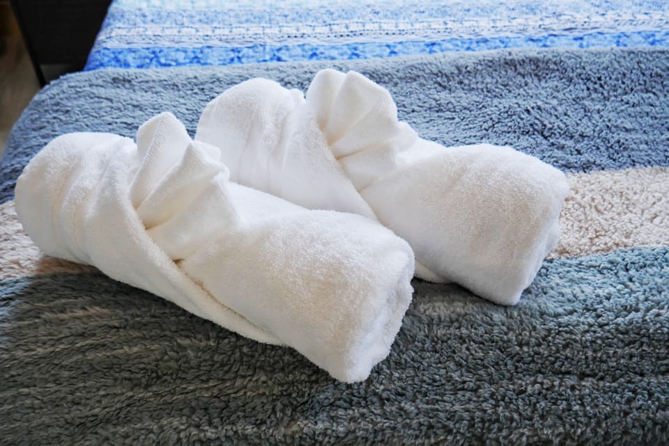 one towel per guest