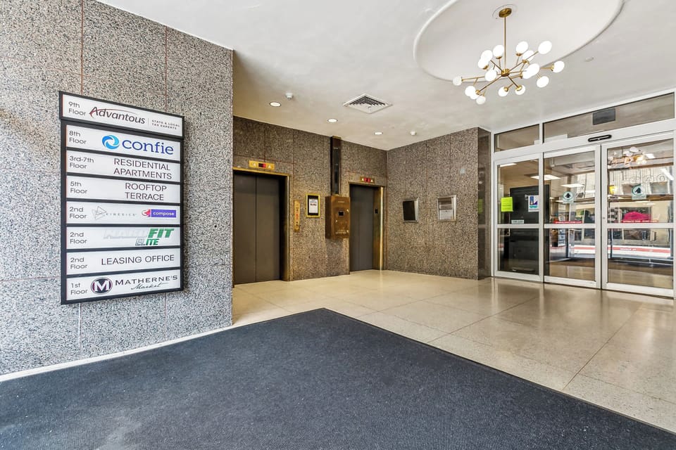 Building main lobby. Elevators up to residential apartments