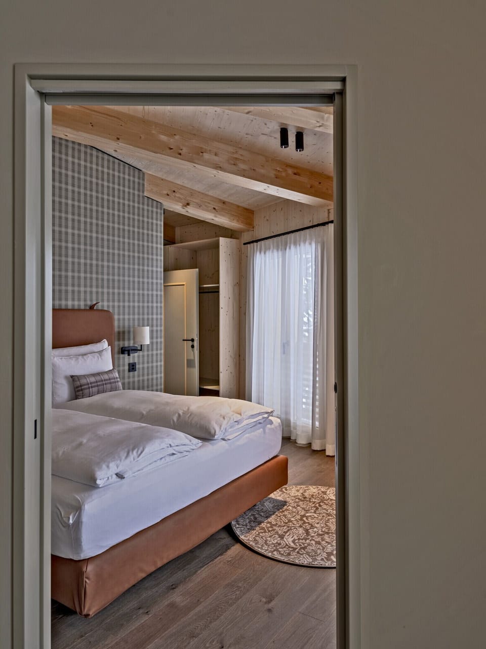 Hypo-allergenic bedding, down comforters, minibar, in-room safe