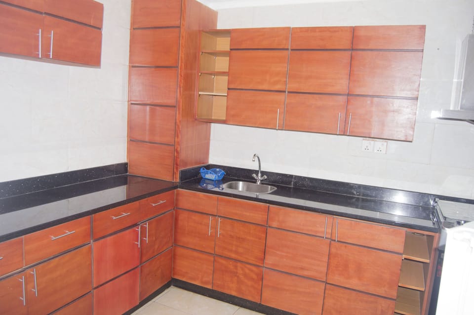 Senior Apartment | Private kitchen | Full-size fridge, microwave