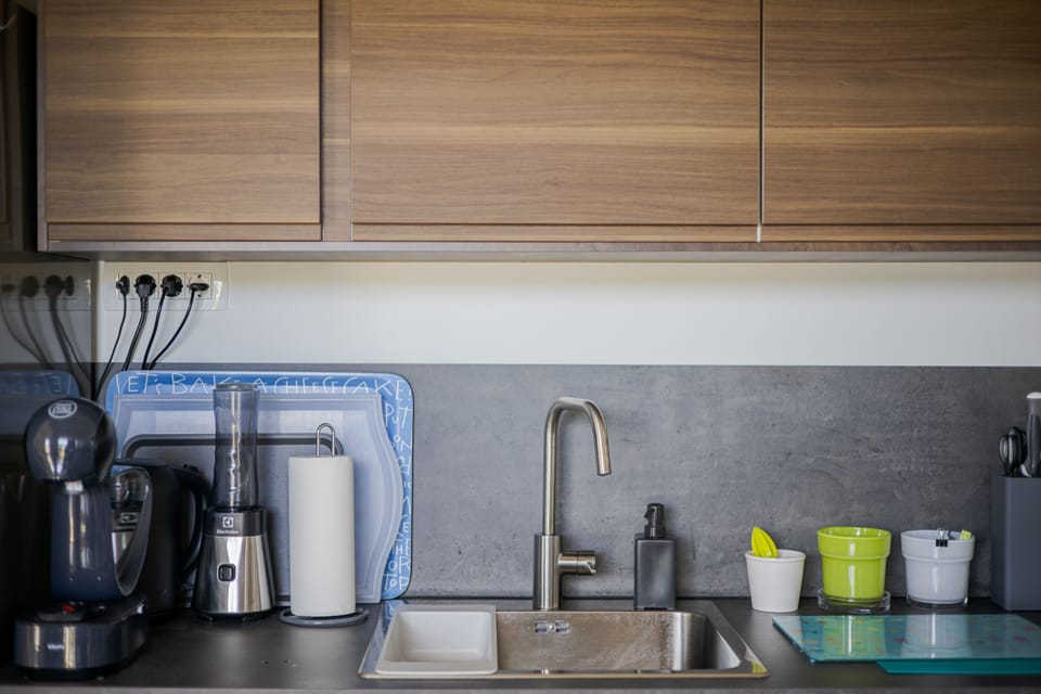 Comfort Apartment | Private kitchen | Full-size fridge, oven, stovetop, dishwasher