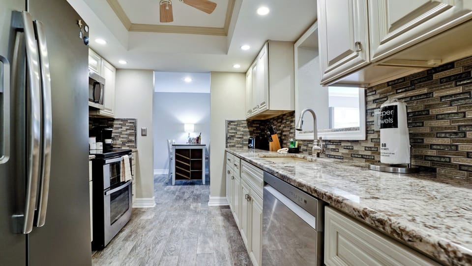 Fully stocked kitchen with dishwasher