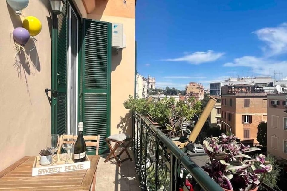 Balcony with view on San Giovanni Basilica, overlooking a quiet street