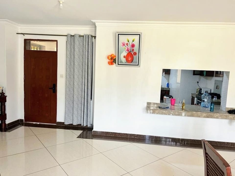 Family Apartment | Living area | 24-inch Smart TV with digital channels