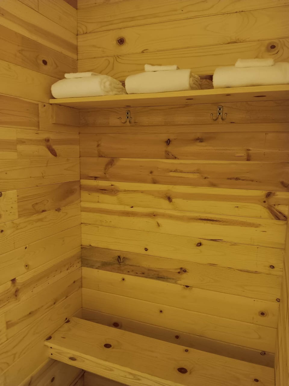 Camp shower seating area