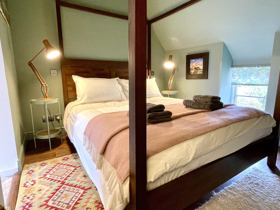Romantic eaves bedroom on second floor