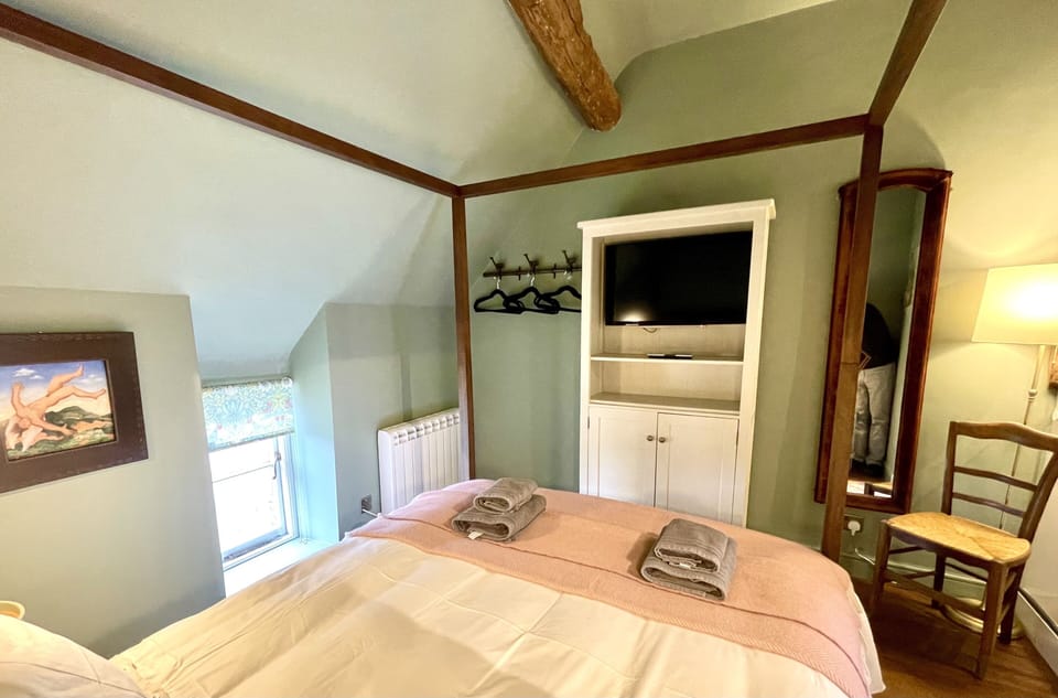 Romantic bedroom under the eaves