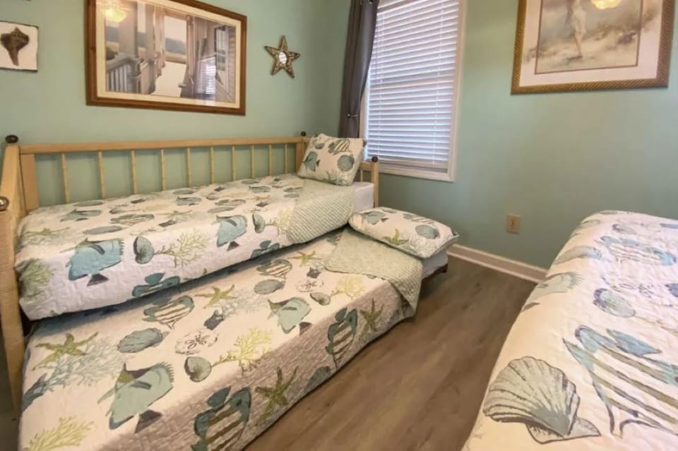 Bedroom 2.  Trundle daybed with 2 twin beds.