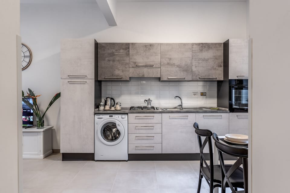 Comfort Apartment | Private kitchen | Full-size fridge, oven, stovetop, dishwasher
