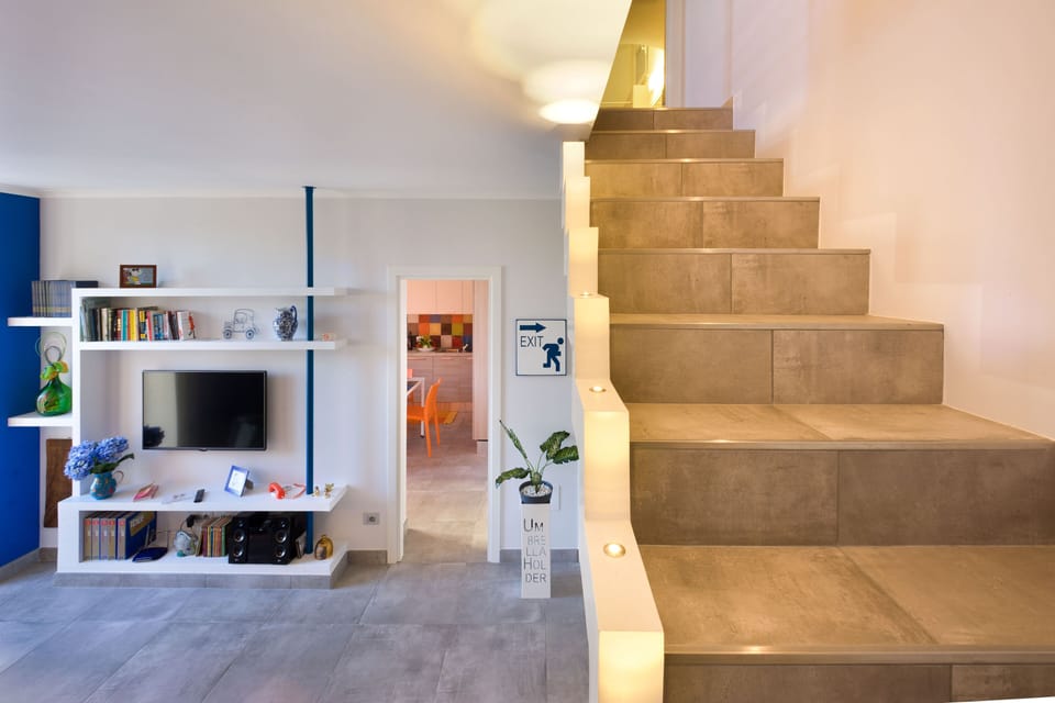 Deluxe Apartment, Terrace, Sea View | Living area | 32-inch flat-screen TV with digital channels