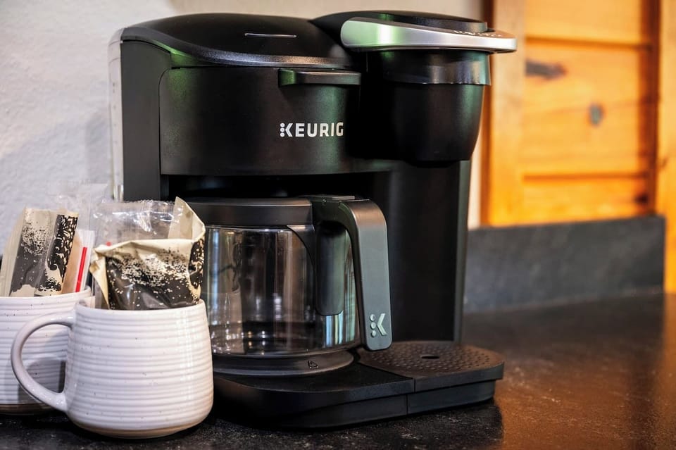 Kitchen: Brew your perfect cup of coffee with our modern Keurig and enjoy each morning!