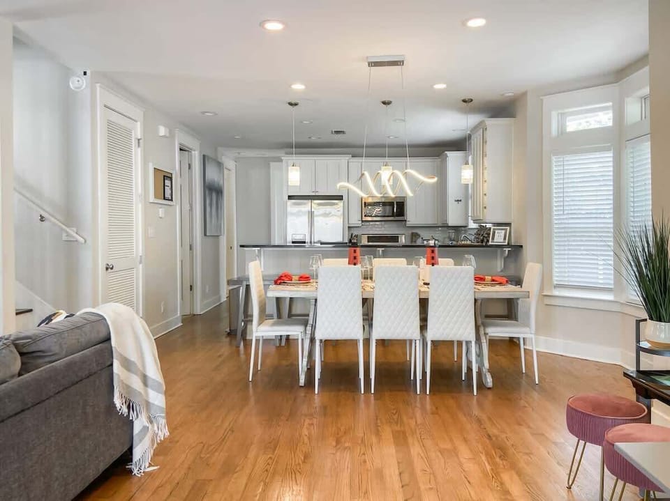 When you walk through the front doors, you’ll enter the kitchen, living and dining areas.