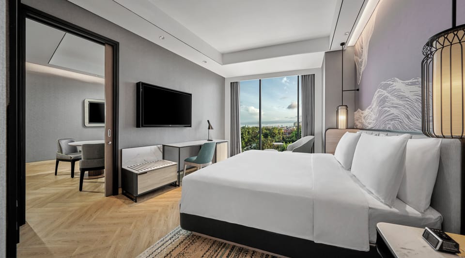 Suite, 1 King Bed with Sofa bed | In-room safe, desk, laptop workspace, iron/ironing board