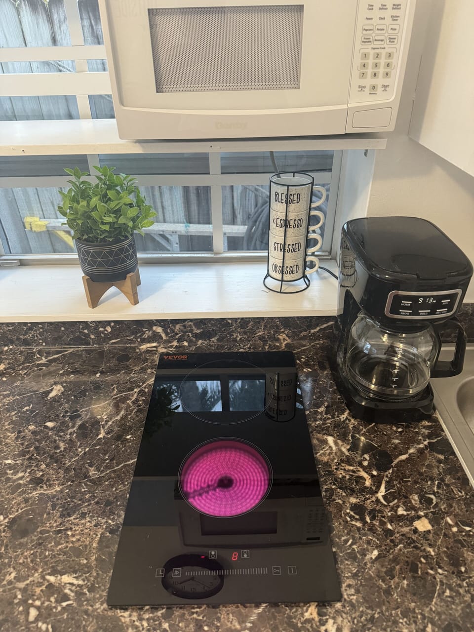 Two burners and Stove in the kitchen