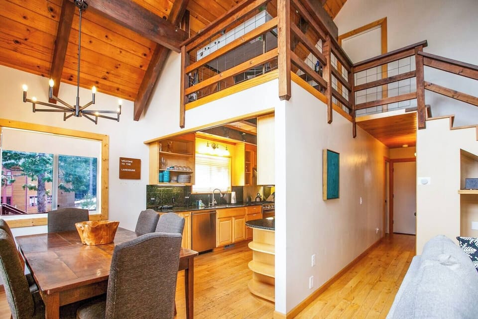 View of the dining room and kitchen from the front door. 