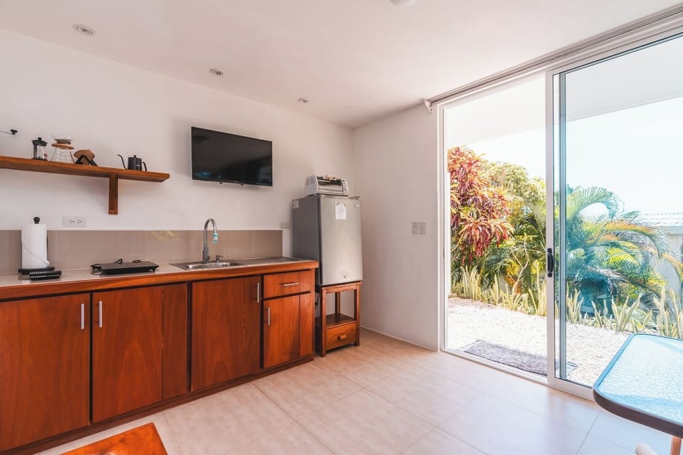 Kitchen area stocked with essentials for your stay