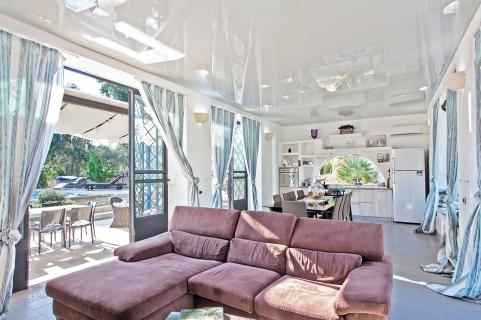 Family Villa, 4 Bedrooms, Terrace (Tenuta Bouganville With Garden And) | Living area | Flat-screen TV