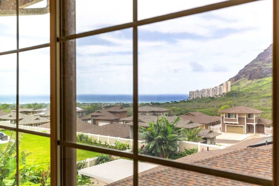 Peaceful window view overlooking the sparkling blue sea