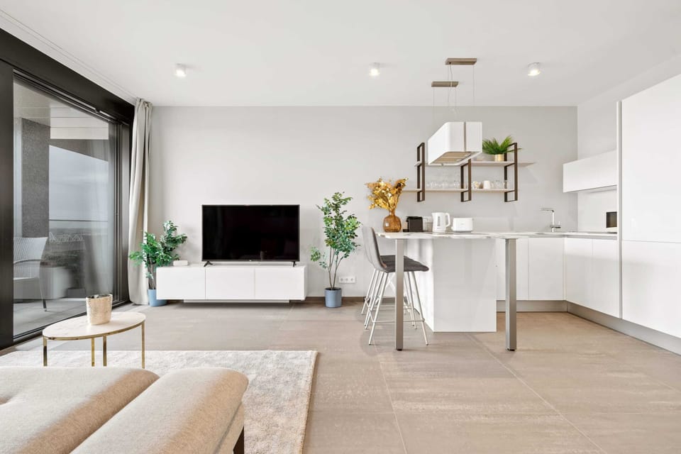 Chic simplicity in our open-plan living area, perfect for your city getaway.