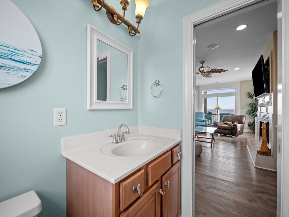 Half Bath off Living Room and Kitchen