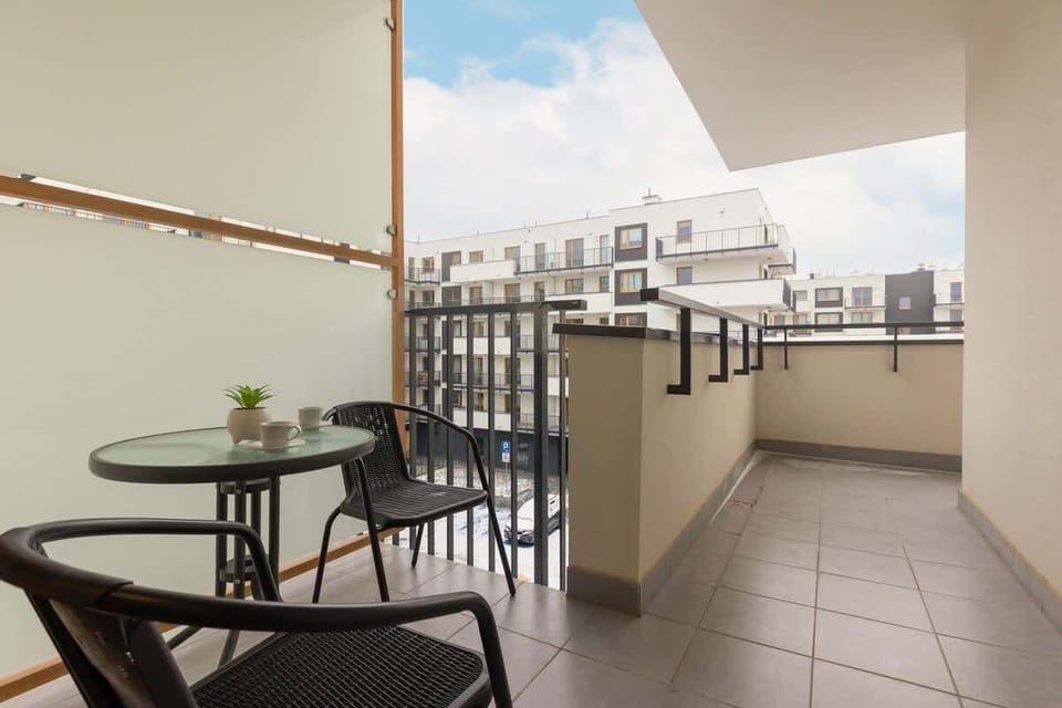 Furnished balcony accessed from the living room and the bedroom