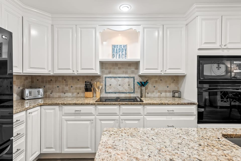 Full-sized, well appointed kitchen.