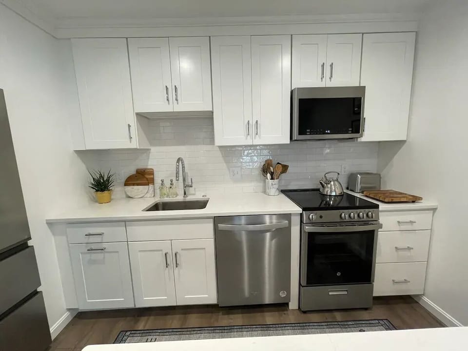 Dishwasher, Stove, Microwave, Stocked Cabinets