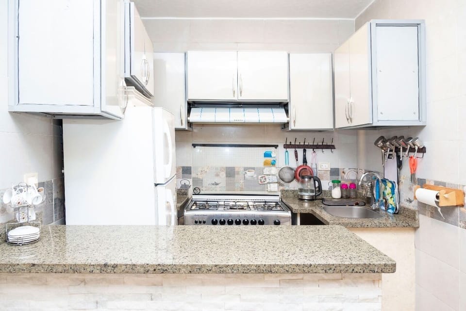 Mini-fridge, oven, dishwasher, coffee/tea maker